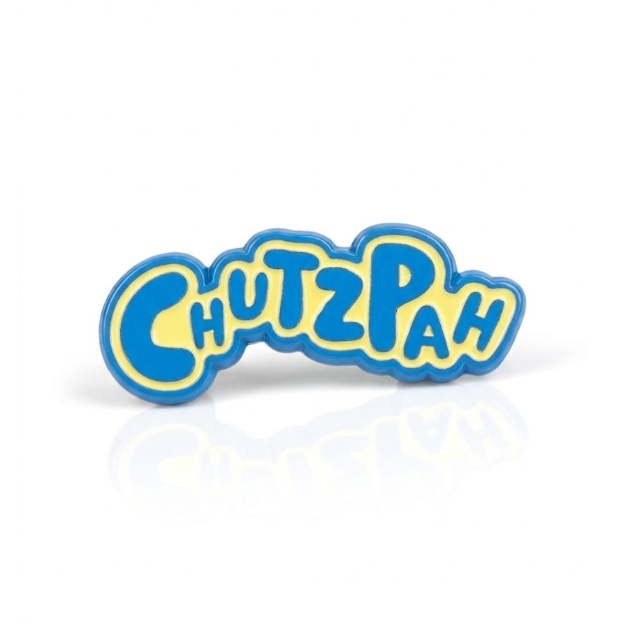 enamel pin of the word chutzpah