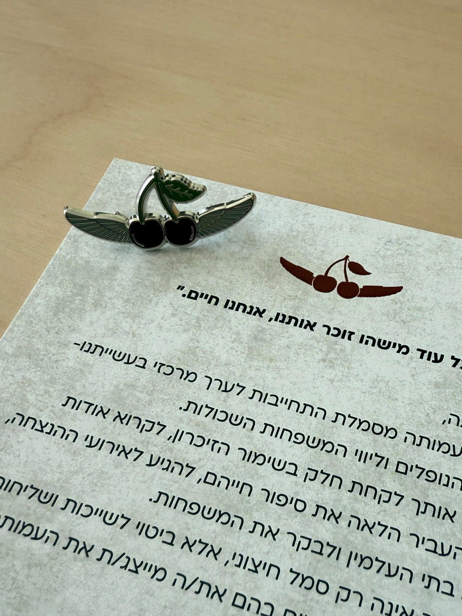 Letter on a wooden surface with a logo at the top