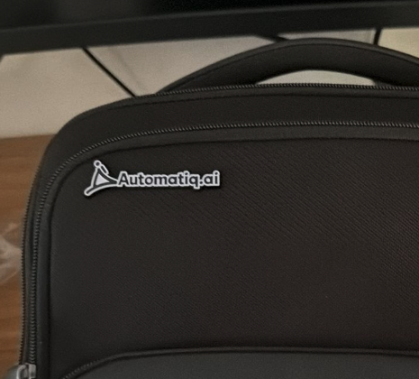 automatiq.ai pin on bag