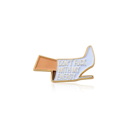 Enamel pin with text 'DON'T F**K WITH MY ENERGY' on a white background
