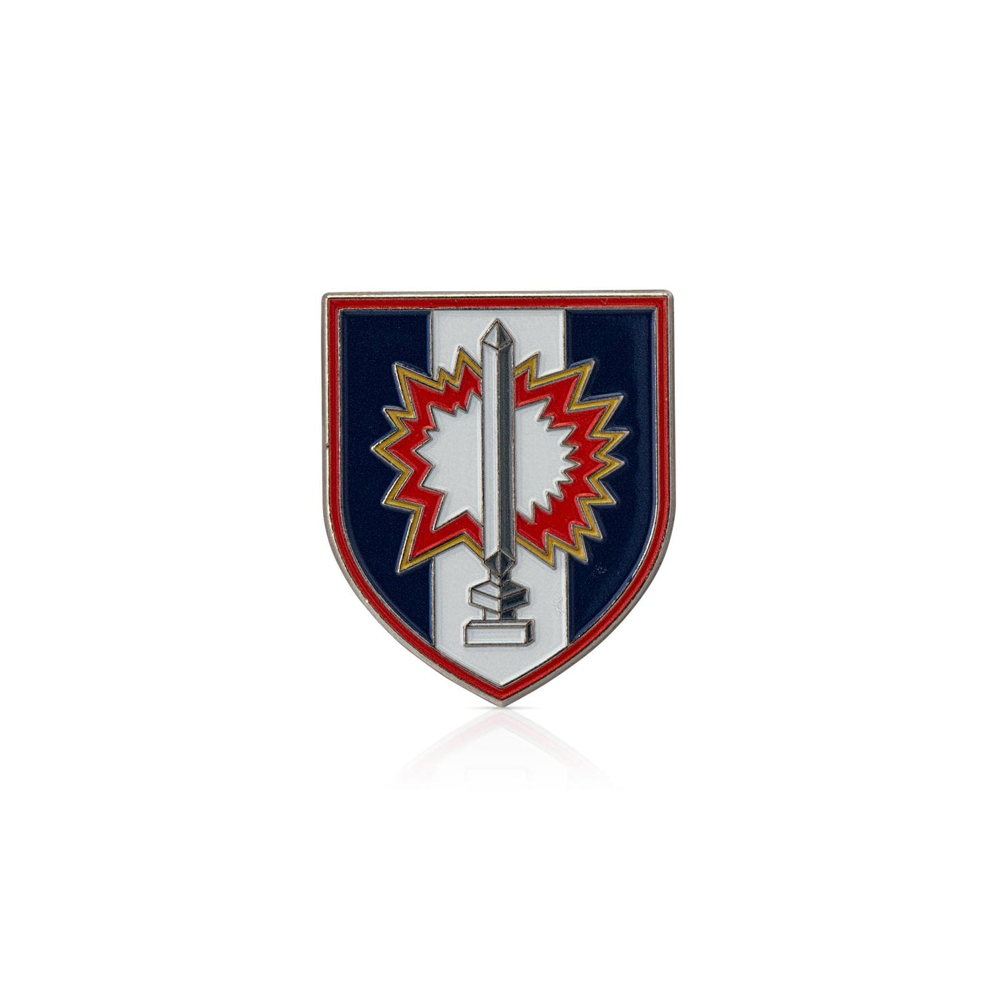 Shield-shaped emblem with a central design on a white background