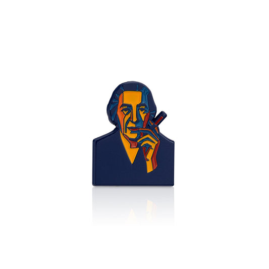 Colorful brooch with a stylized portrait on a white background