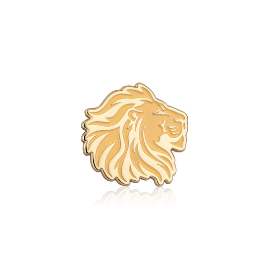Gold lion head pin on a white background