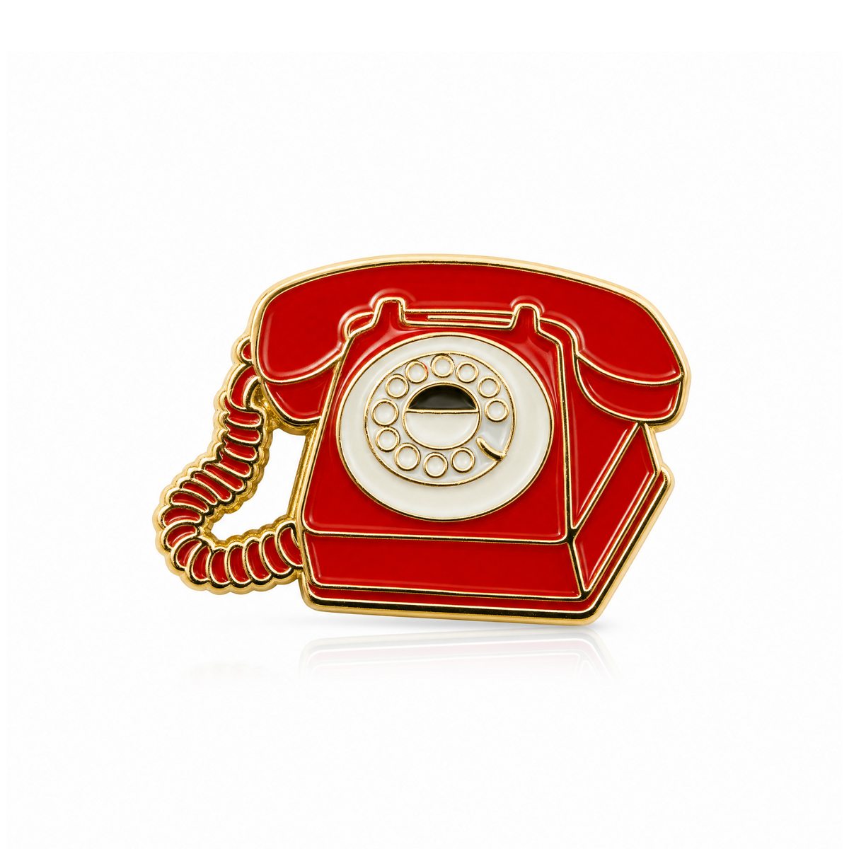 A vintage-style rotary telephone enamel pin in red with gold metal outlines and a cream-colored circular dial, shown on a clean white background.