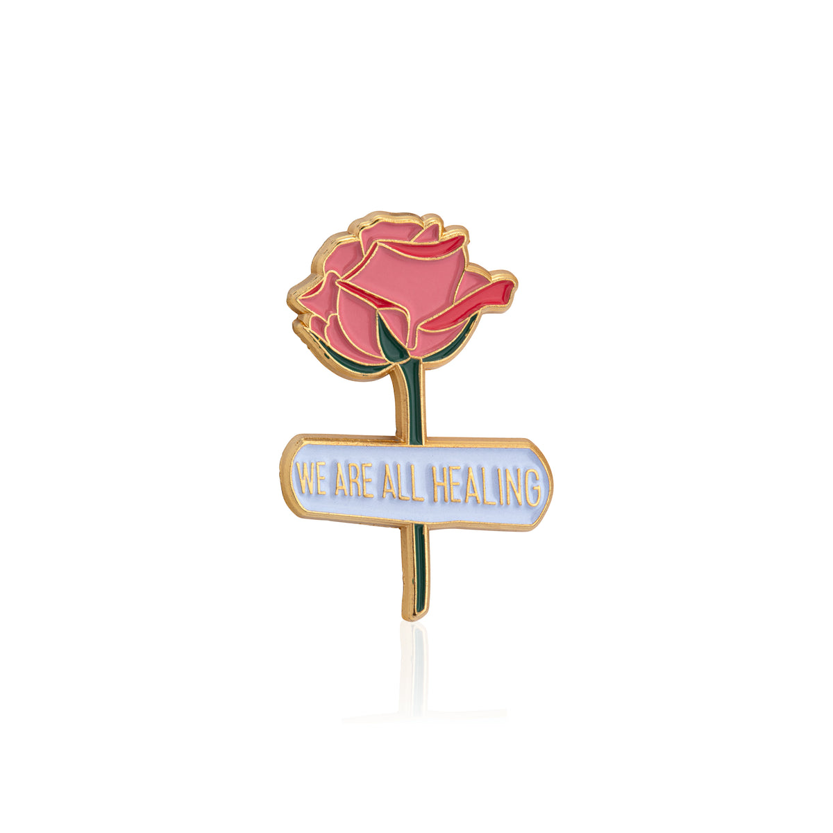 Pin with a pink rose and 'WE ARE ALL HEALING' sign on a white background